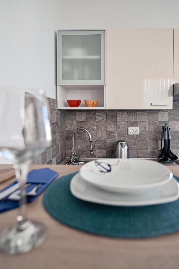 Remi Apartment Sukosan Bagian luar foto